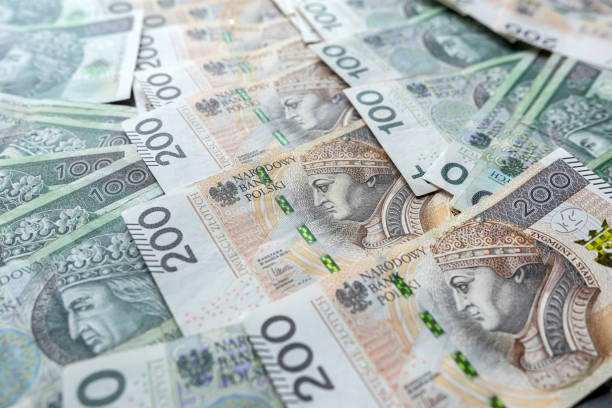 istock Many polish banknotes 100, 200 as financial background 2148972058