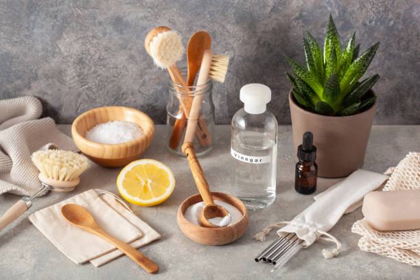 istock zero waste eco friendly cleaning kitchen concept. wooden brushes, lemon, baking soda, vinegar, drinking straw 2148973335