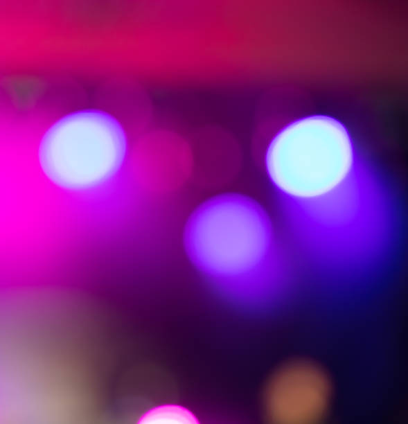istock Bokeh from the concert from pink blue light 2148973594