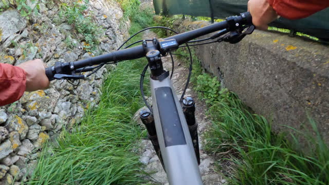 First person perspective of riding rugged trail