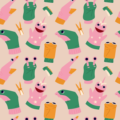 Seamless pattern with hand puppets. Childish puppets and toys.