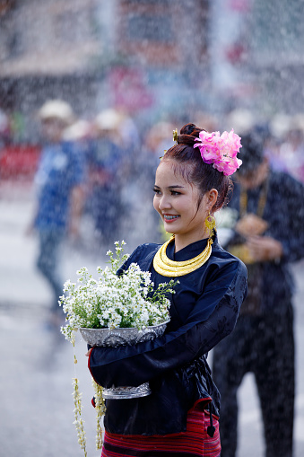 ChiangMai , Thailand - APR 16 2024 : Songkran festival (Thailand new year)  have fun splashing water around street on an annual basis In Chiang Mai Thailand.