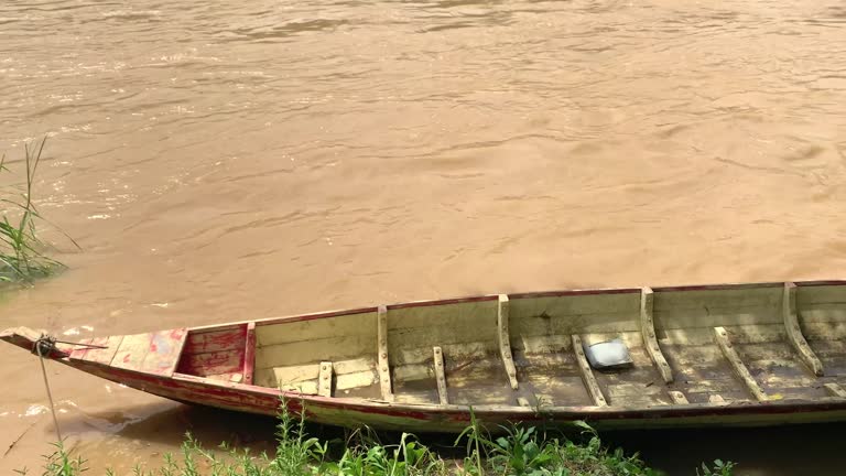 A wooden boat on a river
