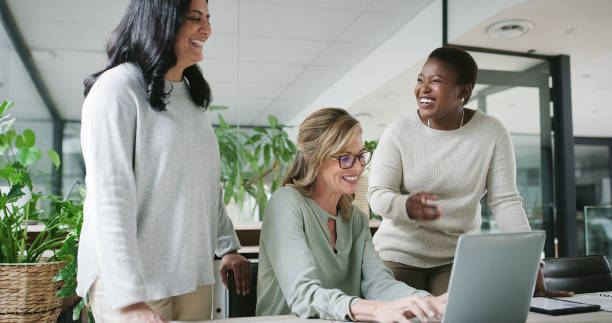 istock Business women, strategy and collaboration on computer for planning or meeting, teamwork and corporate communication in office. Professional people, manager and employees on laptop for company ideas 2148977274