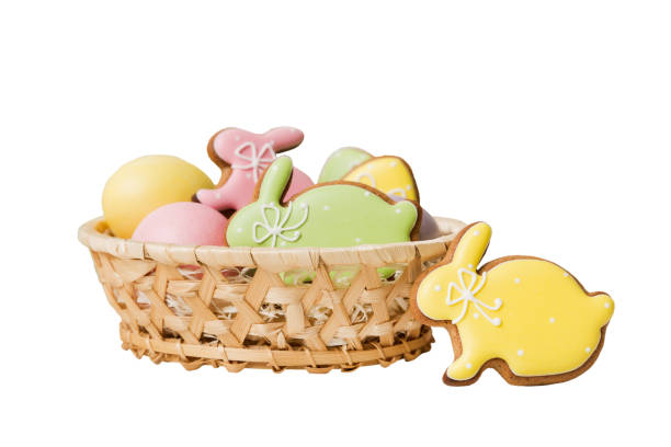 istock Colorful easter cookies in basket with Multi colors Easter eggs isolated on white background. Pastel color Easter eggs. holiday concept 2148977818