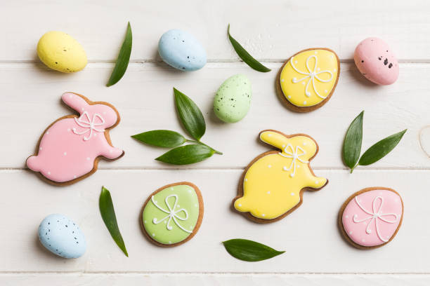 istock Happy Easter concept. Preparation for holiday. Easter eggs on colored background. flat lay top view copy space banner 2148977836