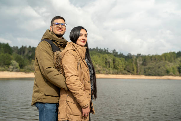 istock Hugging couple looking at the beautiful landscape 2148978351