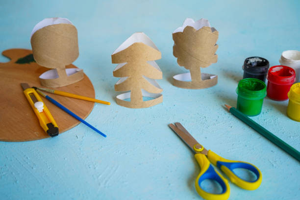 istock Kids craft trees out of recycling toilet paper roll, zero waste concept. Step by step tutorial - 3. 2148979179