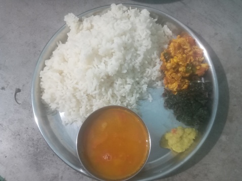 Photo of dal rice and sabji chatne in the steel plate
