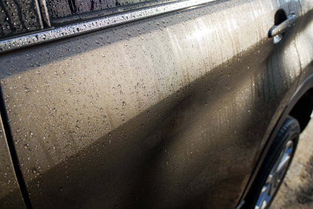 istock Morning dew on a gray car body 2148979763