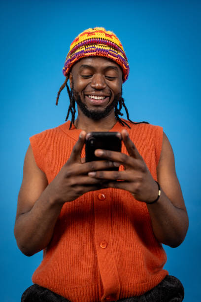 istock Smiling At The Phone 2148979906