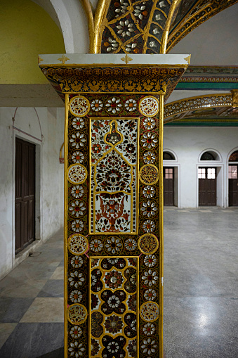 Colourful glass work on a pillar, Moti Mahal, it was used as the Assembly Hall of Madhya Bharat during Scindia State period, Gwalior, Madhya Pradesh, India