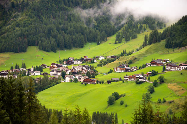 istock Dolomite alps with a mountain village and green meadows 2148980926