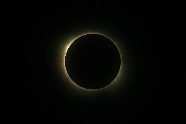 istock Total Solar Eclipse through swirling clouds and fog at Garner State Park Texas.  Great American Mexican Eclipse GAME 2024 2148981419
