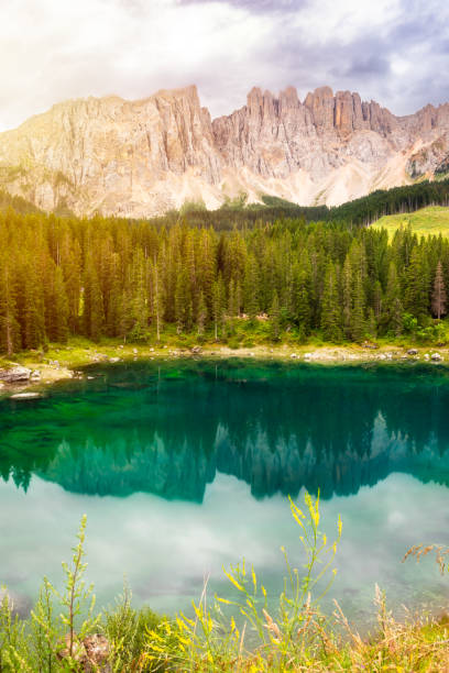 istock Carezza lake surrounded by forest and mountains in Dolomite alps, Italy 2148981745