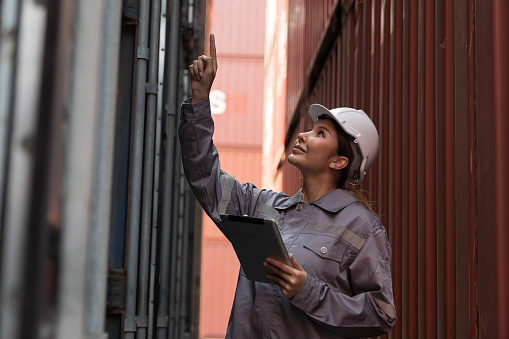 Female Container Female Container Yard Worker Loading Containers Box At Commercial Dock ...