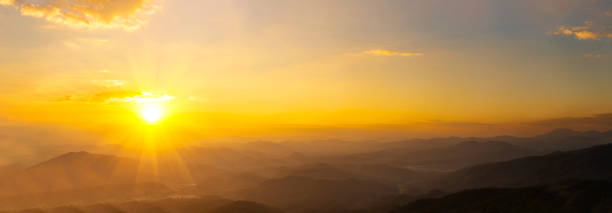 istock Banner Scenic view dramatic beautiful sunset sky. Panorama Natural Sunset Sunrise on meadow silhouette shadow dark land. Vibrant dramatic sky in Countryside. Landscape Sky At Sunset with copy space 2148990142