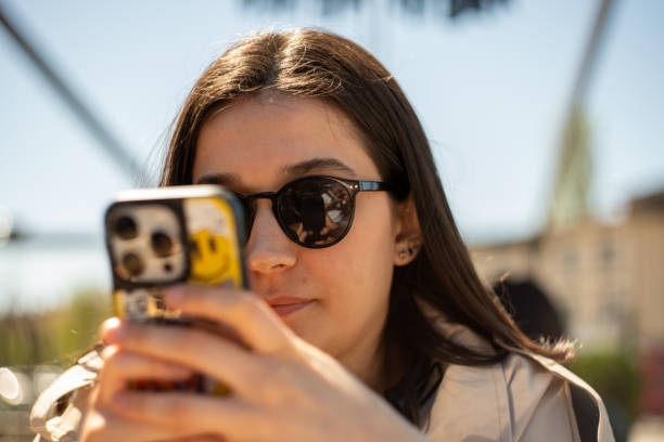 istock Traveller woman is using phone 2148991587