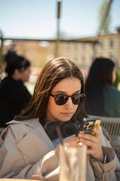 istock Traveller woman is using phone 2148991638