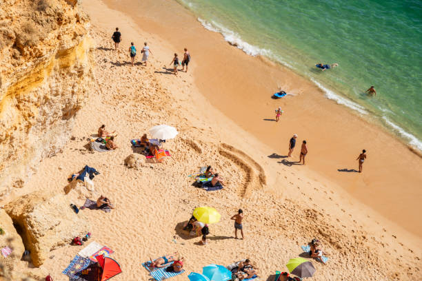 istock Sunny Beach Day in Lagos, Algarve with Crowds Relaxing 2148992755