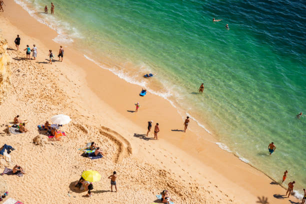 istock Sunny Beach Day in Lagos, Algarve with Crowds Relaxing 2148993251