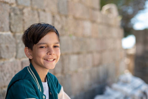 11 years old little boy with a happy cute smiling face