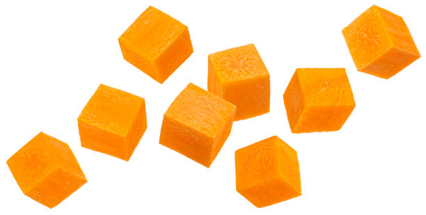 istock Carrot cubes isolated on white background, full depth of field 2148994897