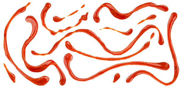 istock Tomato sauce drops, ketchup splashes isolated on white background 2148995244