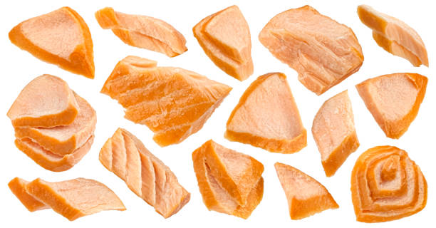 istock Hot smoked salmon pieces isolated on white background 2148995281
