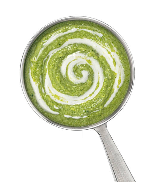 istock Broccoli cream soup in ladle isolated on white background, top view 2148996180
