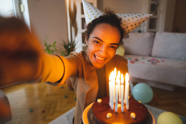 istock Starting a video call for online birthday party 2148999242
