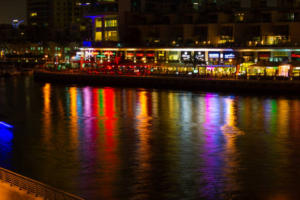 DUBAI, UAE - NOVEMBER 14: Nightlife in Dubai Marina. UAE. November 14, 2012. Dubai was the fastest developing city in the world between 2002 and 2008.
