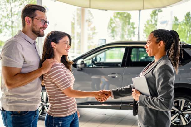 istock Successful deal in a car showroom! 2149000740