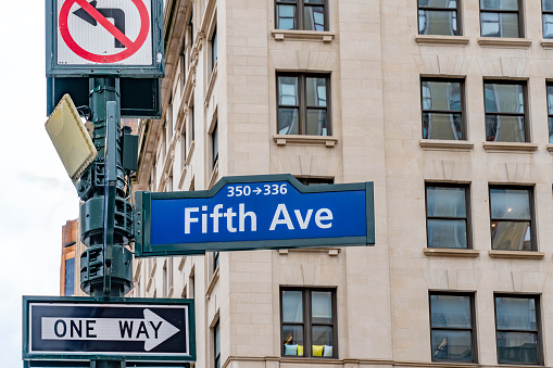 Road signs for Fifth Avenue and One Way system in Manhattan.