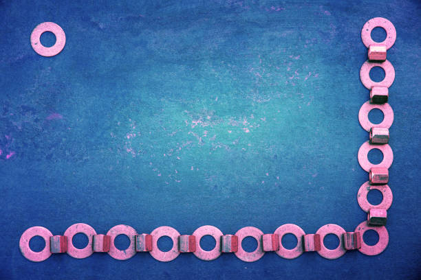 Abstract grunge blue metallic background from extended nuts and washers