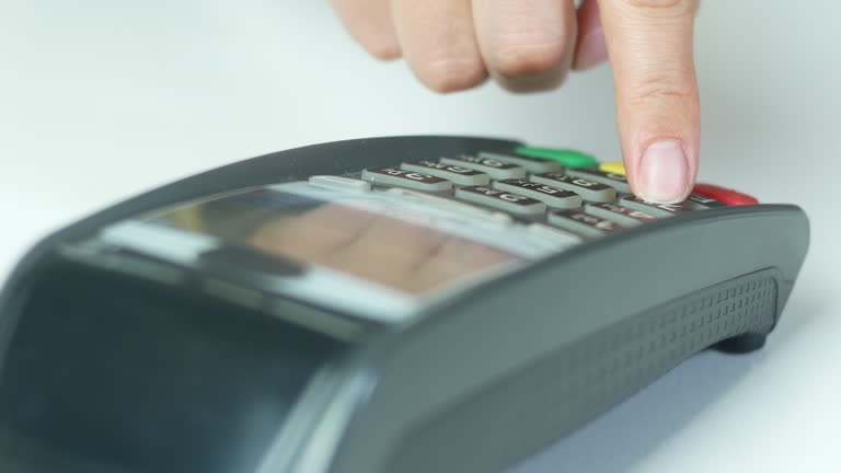 Payment by credit card and entering a PIN code at the POS terminal