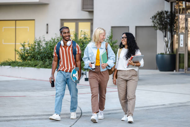 istock Happy students on the street after classes 2149007147
