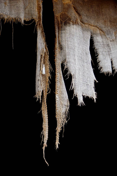 tattered-burlap-curtains-in-