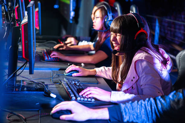 istock Young woman laughing during an esports game 2149011630