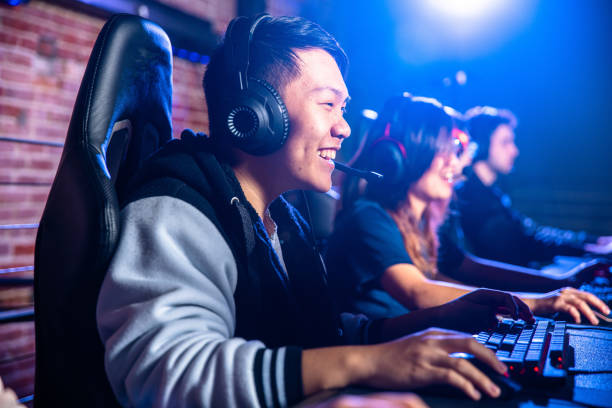 istock Young Asian Man playing eSports game 2149011701