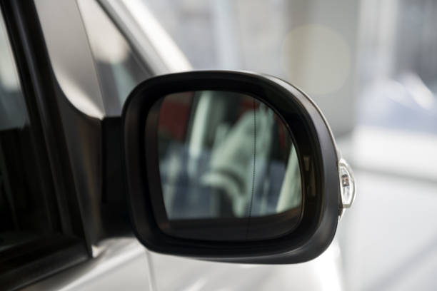 istock look in the rear view mirror of a grey car 2149017893