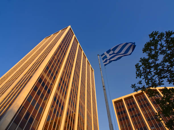 istock Skyscrapers low angle view with greek flag 2149018927