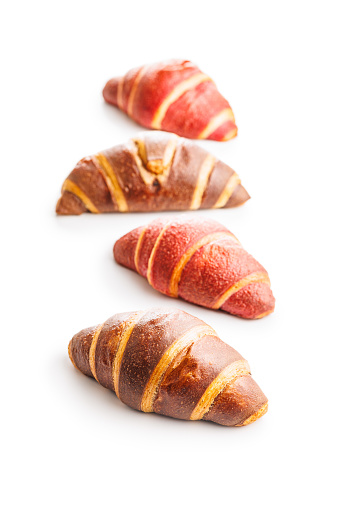 Freshly Baked fruity and Chocolate Croissants Isolated Against a White Background
