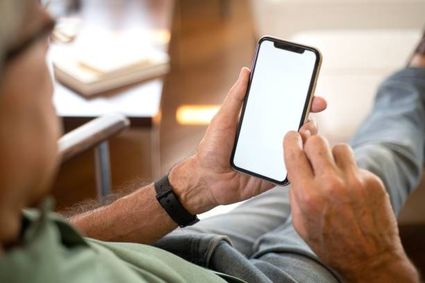 istock Sitting at home holding smartphone. 2149019981