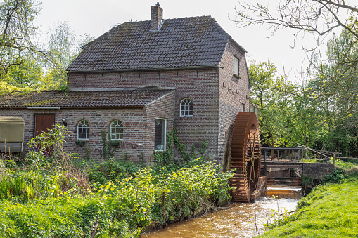 Old watermill - Holtmeulen, along the Oostrumse Beek near the village of Geijsteren in the Netherlands.