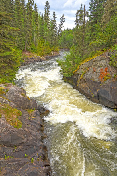 istock Tumbling Rapids in the Rocky Forest 2149020897