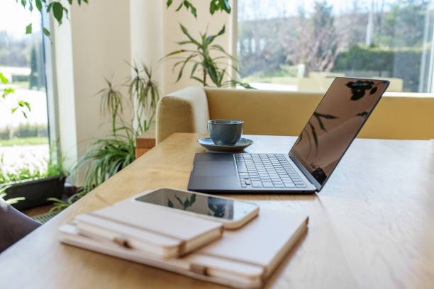 istock Remote Work Setup with Laptop, Coffee, and Smartphone 2149023297