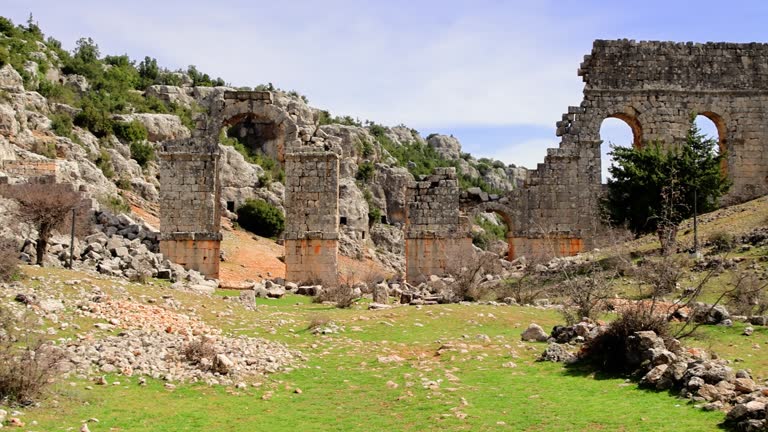 Panoramic video of Olba ruins, Turkey, featuring antique wall, main gate. Drone captures antique wall, Roman cityscape. Explore antique wall, historic remnants
