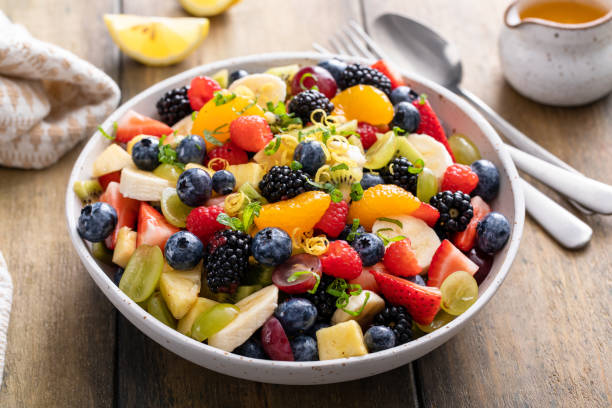 istock Healthy and colorful fruit salad with orange dressing and fresh mint 2149028268