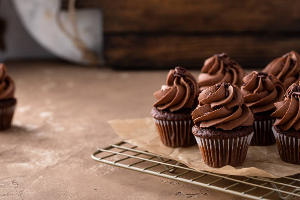 istock Dark chocolate cupcakes with chocolate ganache frosting 2149028358